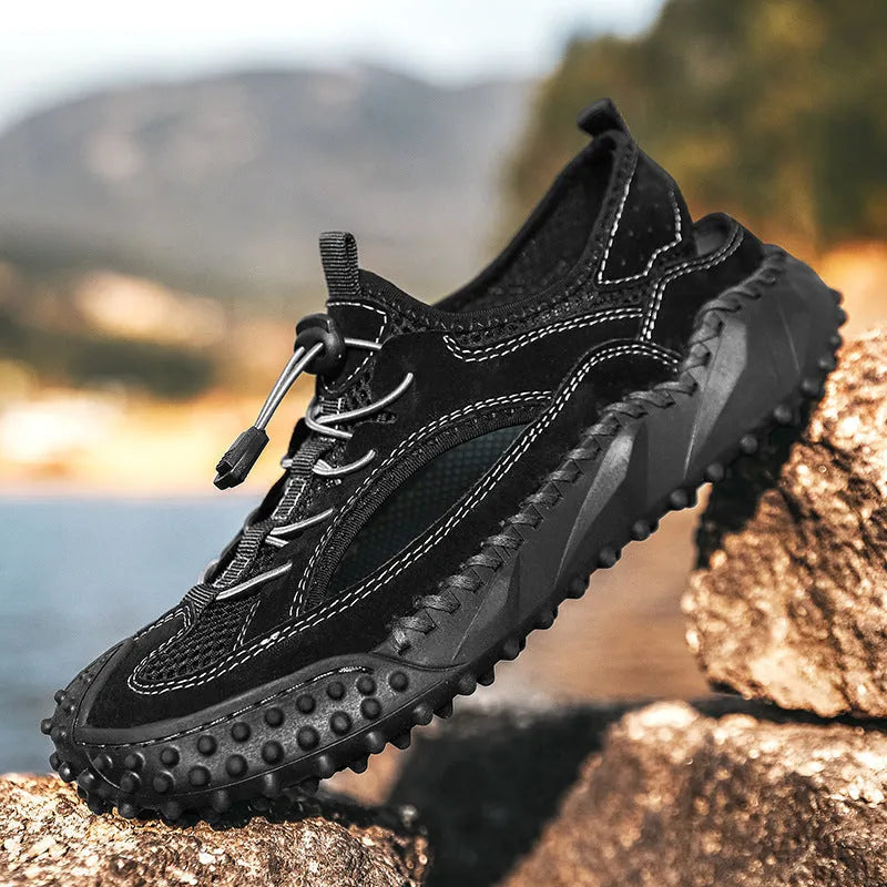 Men's black sports sandals with leather mesh upper, elastic band and non-slip rubber sole.