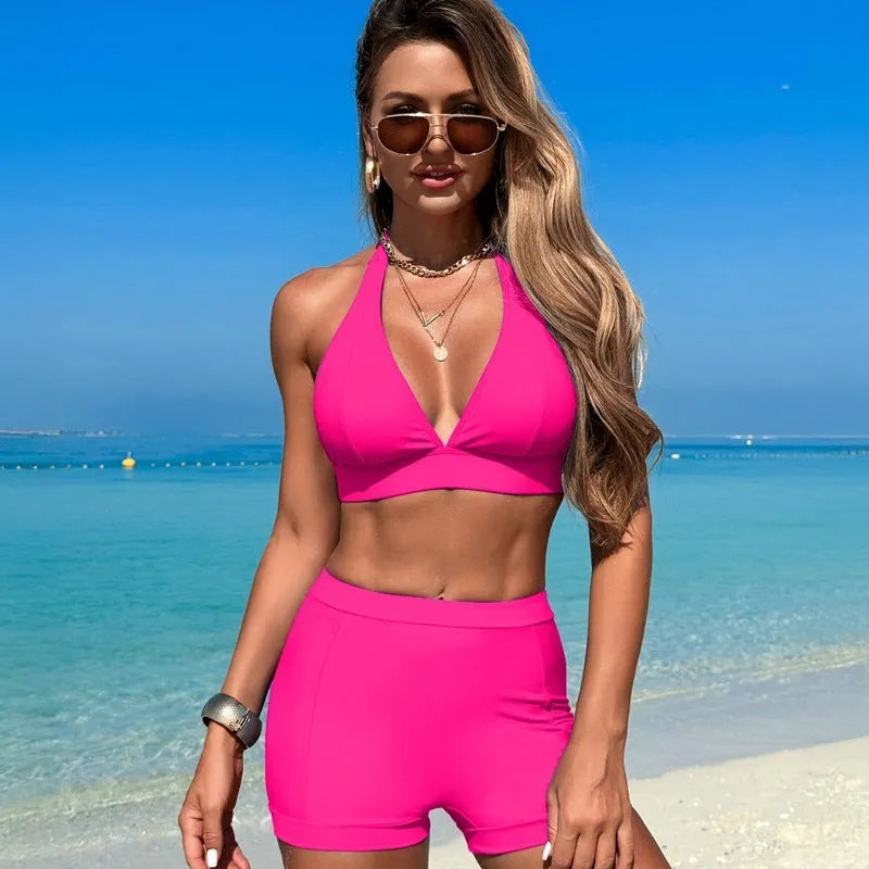 Women's black split bikini swimsuit made from nylon with polyester lining.