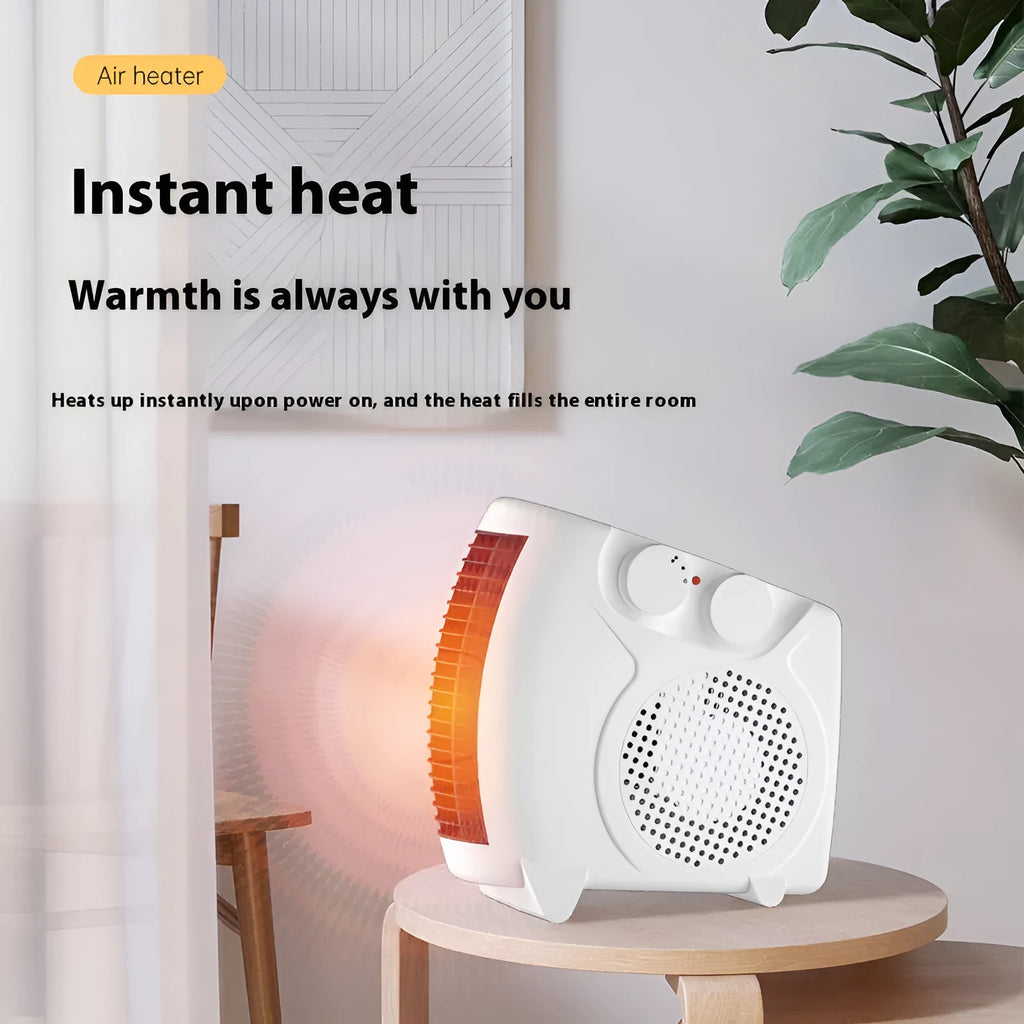 Small white electric space heater with a rectangular design, suitable for desktop or floor use.