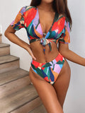 Red printed women's split swimsuit bikini for swimming and surf sports.