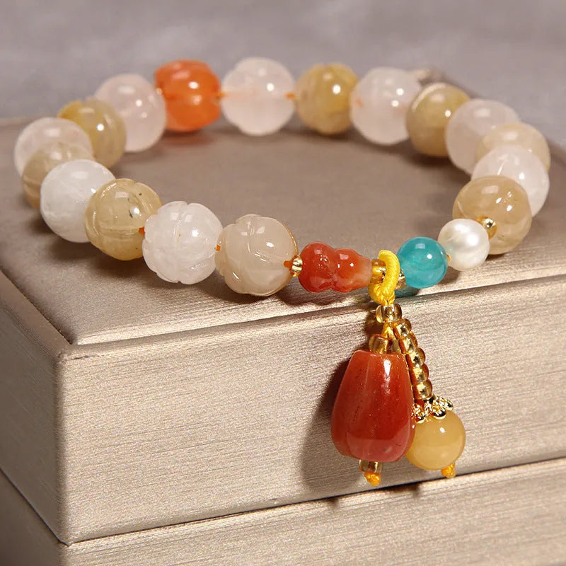 Yellow agate crystal women's bracelet with gold silk thread wrapping in khaki colour