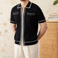 Slim-fit knitted polo shirt with a lapel collar and short sleeves in black or white.