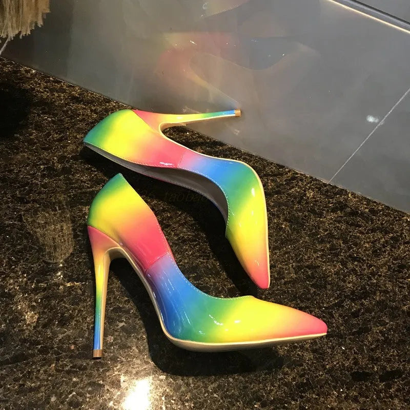 Rainbow glossy patent leather women's high heel shoes with pointed toe and thin high heel.