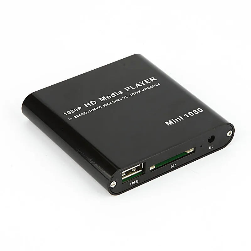 Compact black and blue all-metal 1080p HD media player with remote control on a wooden surface.