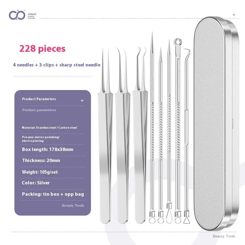 Four silver metal acne needles with pointed tips laid out on a surface.
