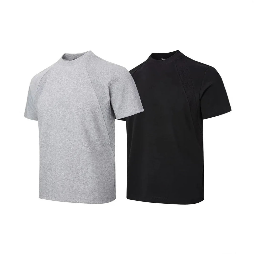 Black loose fit short sleeve top with air layer stitching detail on a hanger