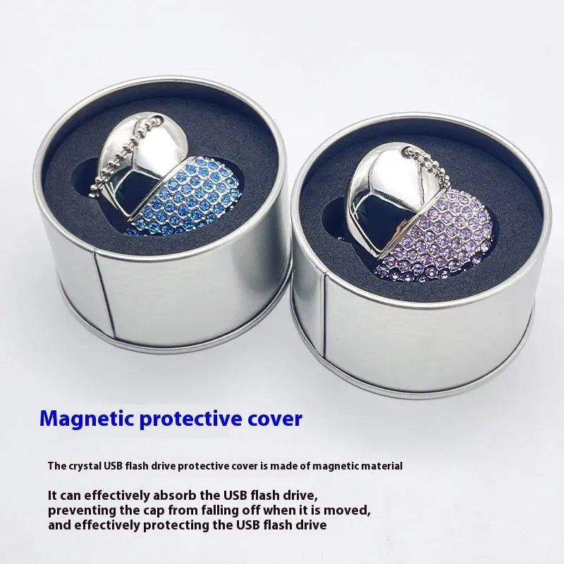 Heart-shaped silver USB drive with brick-like pattern, shown alongside blue and pink coloured versions.