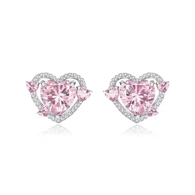 Women's heart stud earrings with white K electroplated finish on copper