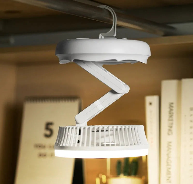 Blue USB charging foldable table fan with LED light showing wall mounting option and 300° tilt adjustment