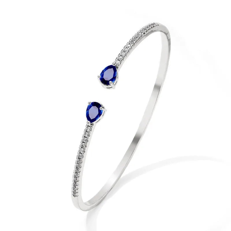 Copper bracelet with inlaid white or blue zircon crystals, simple fashion jewellery design