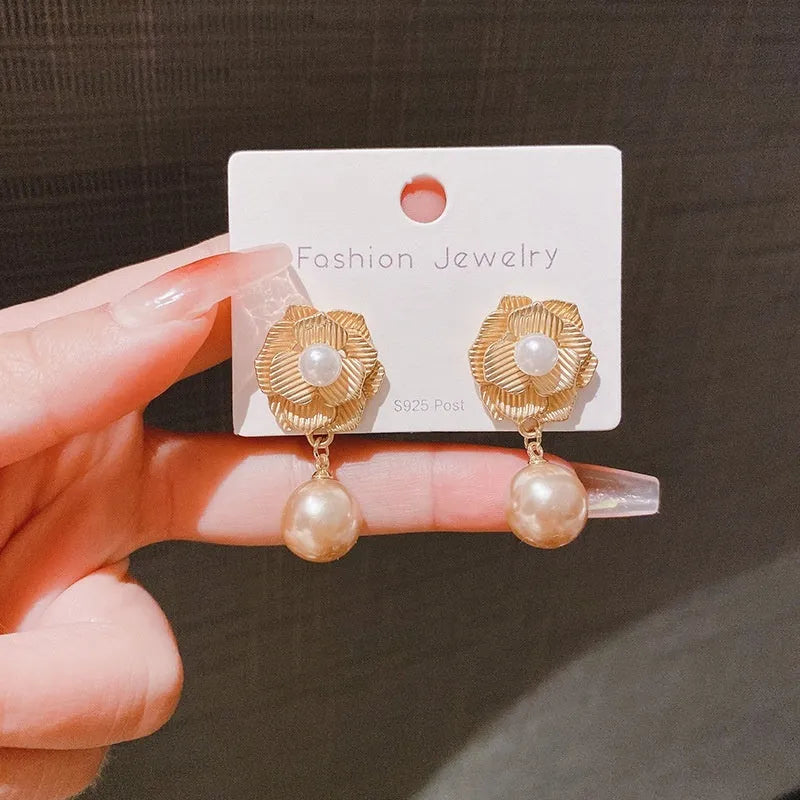 Gold coloured flower stud earrings with opal stone and ice flower design on silver electroplated alloy