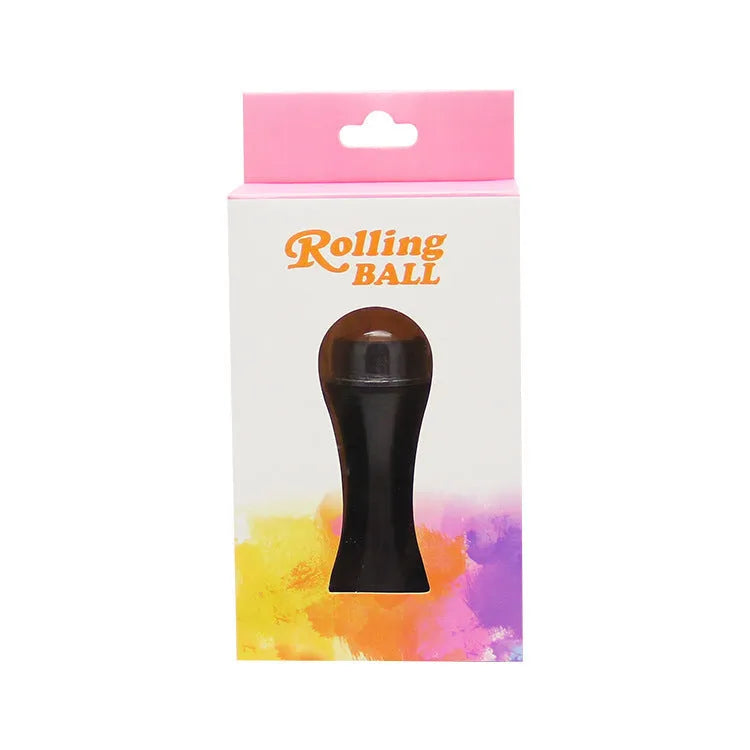 Volcanic stone portable roller for oily skin in black, green, pink or white on a grey background.