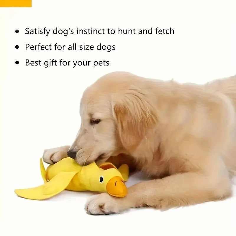 Yellow teddy dog training toy with integrated duck doll and food leak compartments
