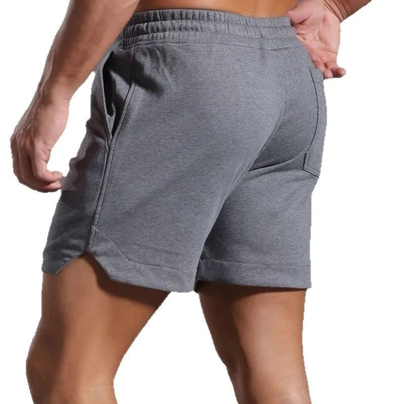 Men's below the knee cotton running capris in charcoal gray, loose fit with mid waist