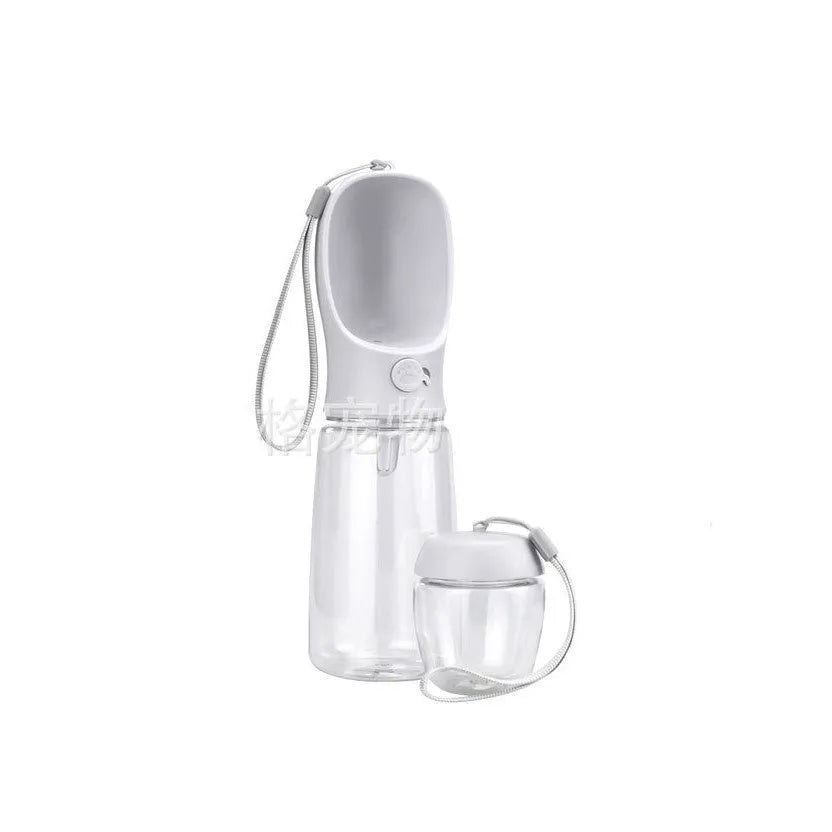 Blue dual-use plastic dog water cup with bottle and bowl design for outdoor walks.