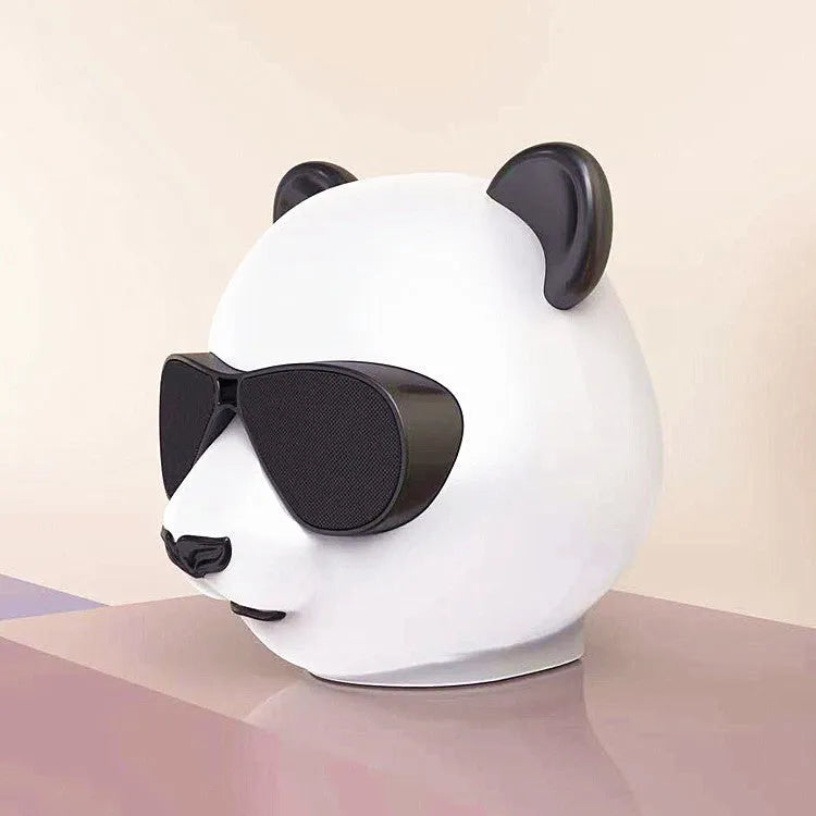 Portable mini classic style Bluetooth speaker with USB port for charging.