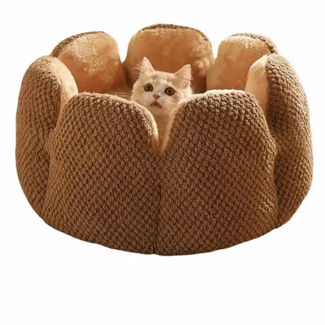 Green cactus-shaped enclosed pet kennel with soft plush interior, shown on a hardwood floor.