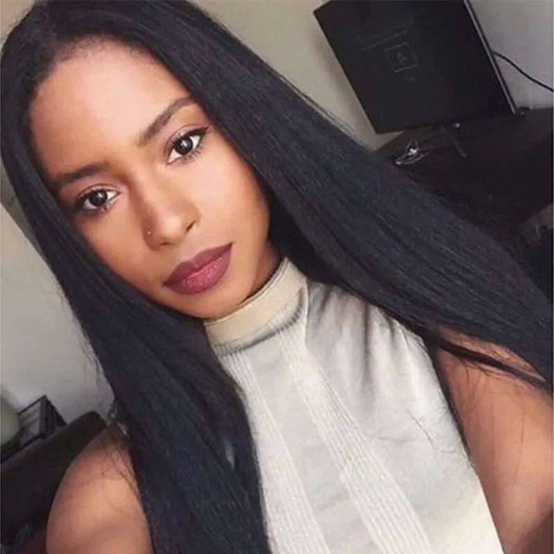 Long black straight hair wig with centre-parted bangs on a model