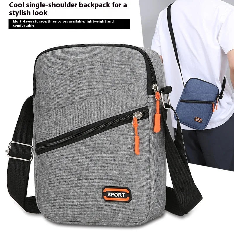 Lightweight oxford cloth crossbody commuter bag in solid colour
