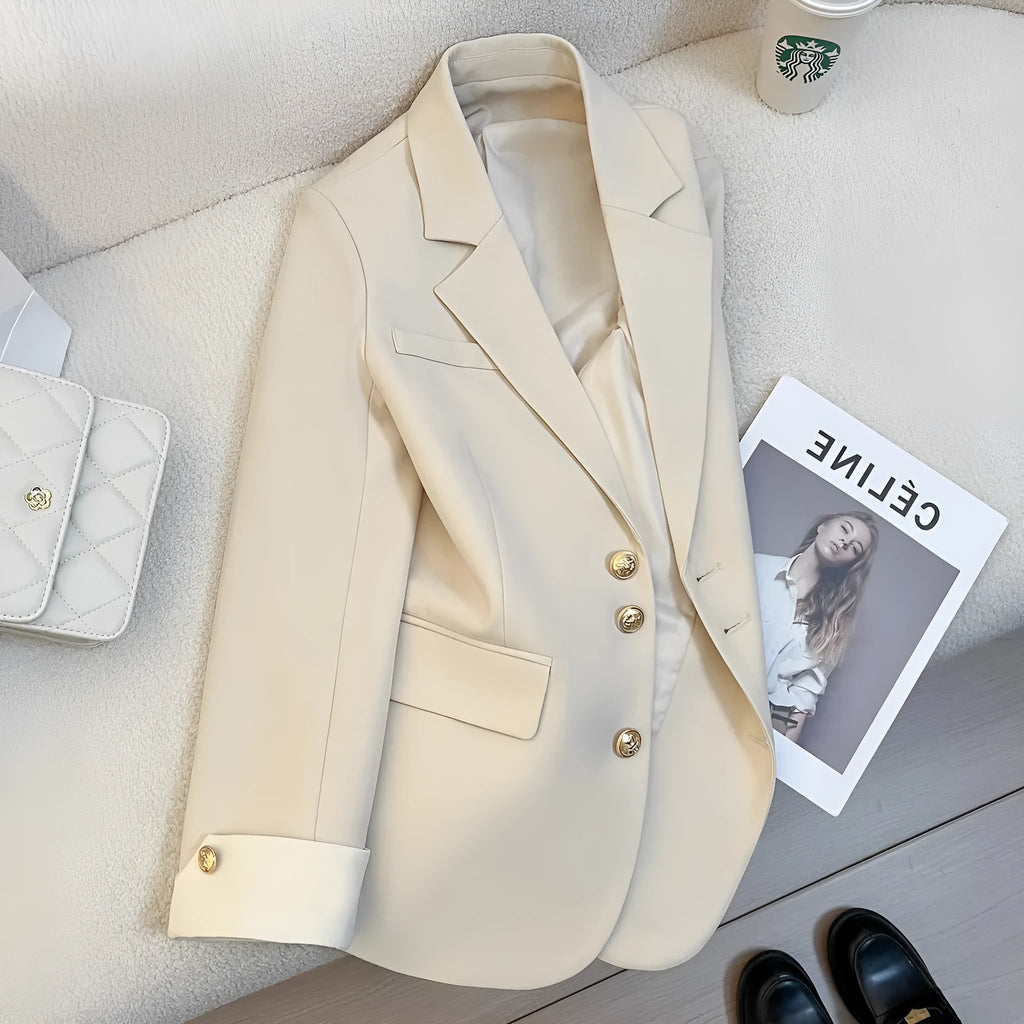 Women's Korean style loose fit mid-length polyester coat in milky white colour with long sleeves and pockets