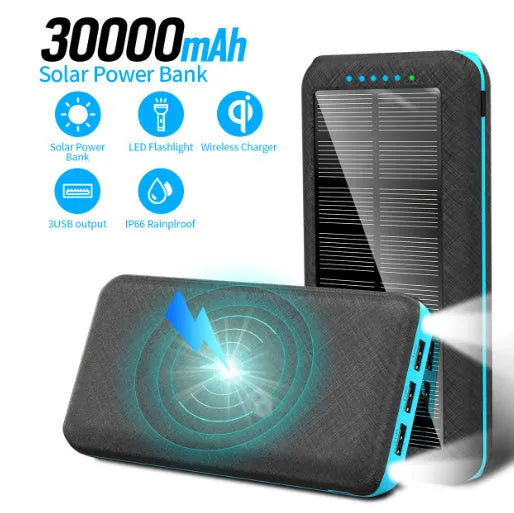 Black portable power bank with Qi wireless charging pad, three USB ports, and an LED flashlight on the front.