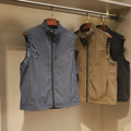 Men's straight cut nylon vest in army green with side seam pockets and cardigan style front