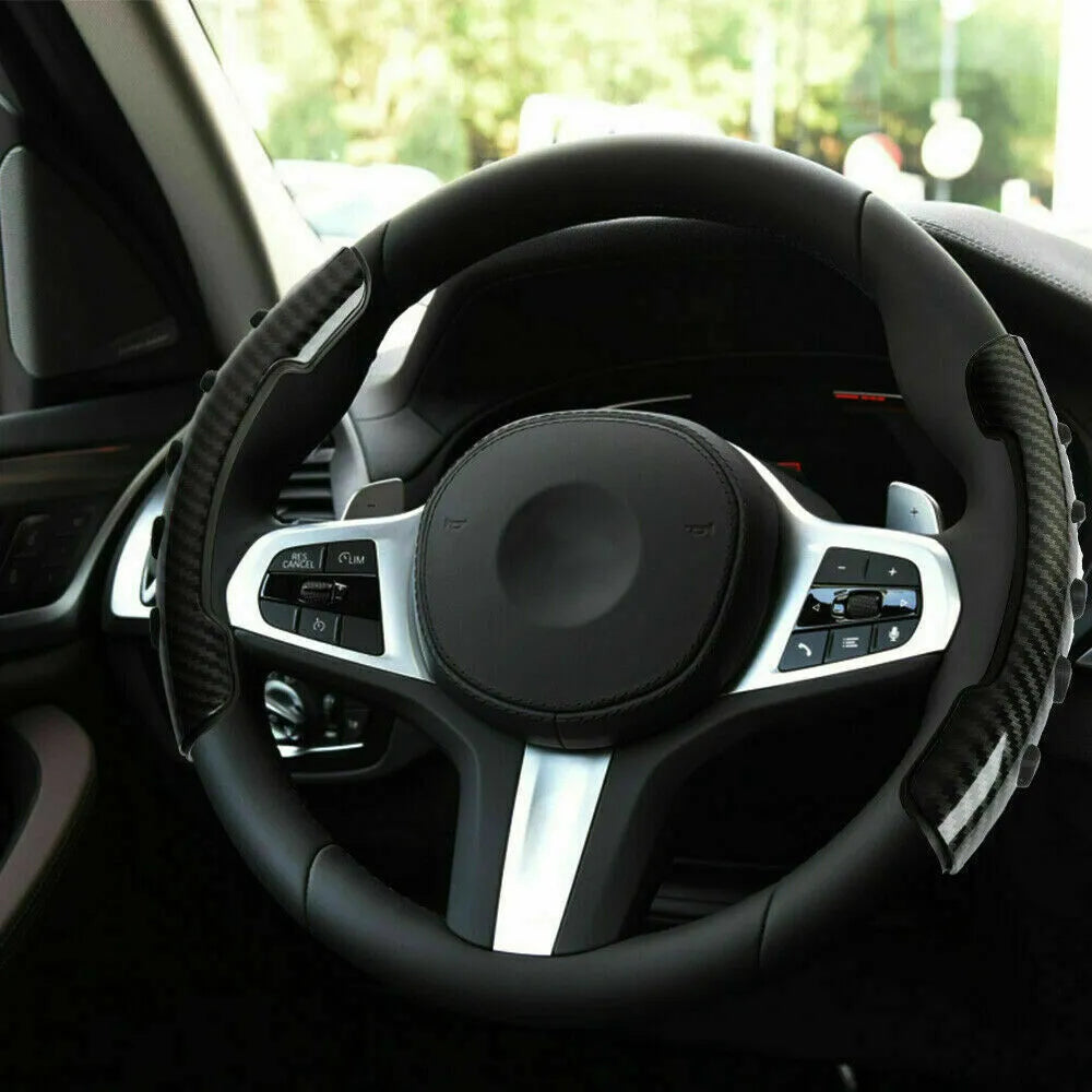Carbon fibre black steering wheel anti-slip sleeve showing textured surface and 38cm diameter measurement