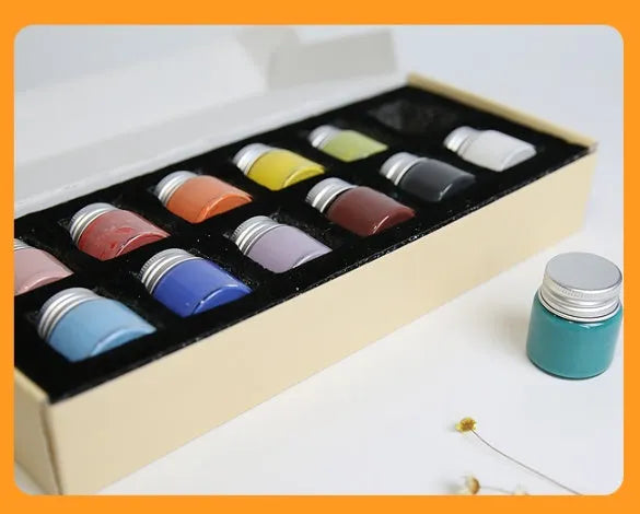 Three pots of Morandi colour ceramic glaze paint in lilac, plant ash, and verdant for high-temperature pottery.