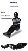 Black patent leather bondage set with nostril clothes and six ratchet tie down straps