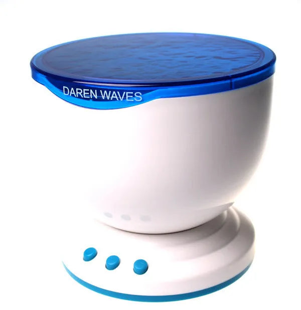 Blue coloured ocean wave light projector with DLP technology on a surface.