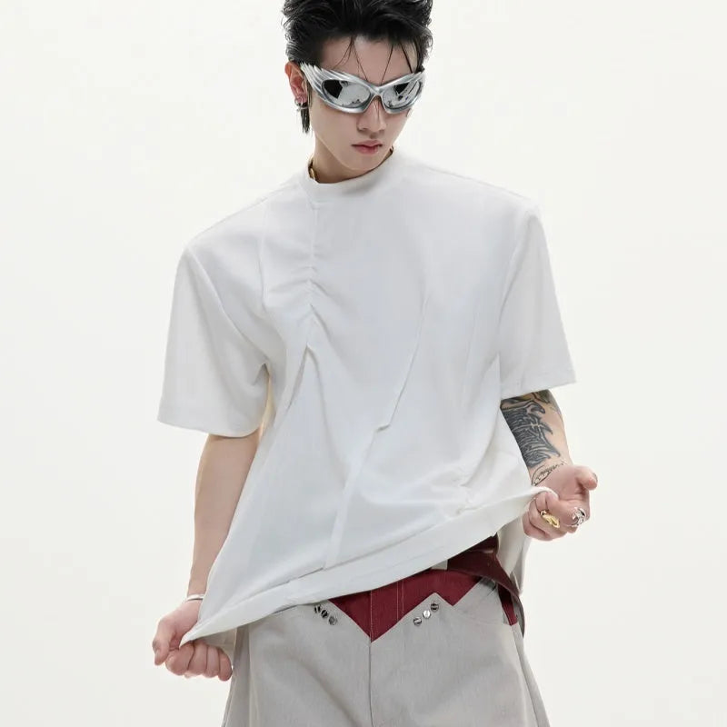 Men's loose fit grey cotton T-shirt with three-dimensional pleated detail on the front.