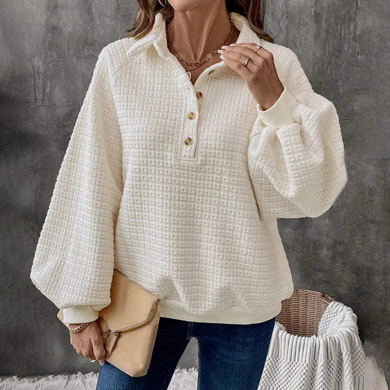 Women's beige polo neck thick polyester sweater on a hanger