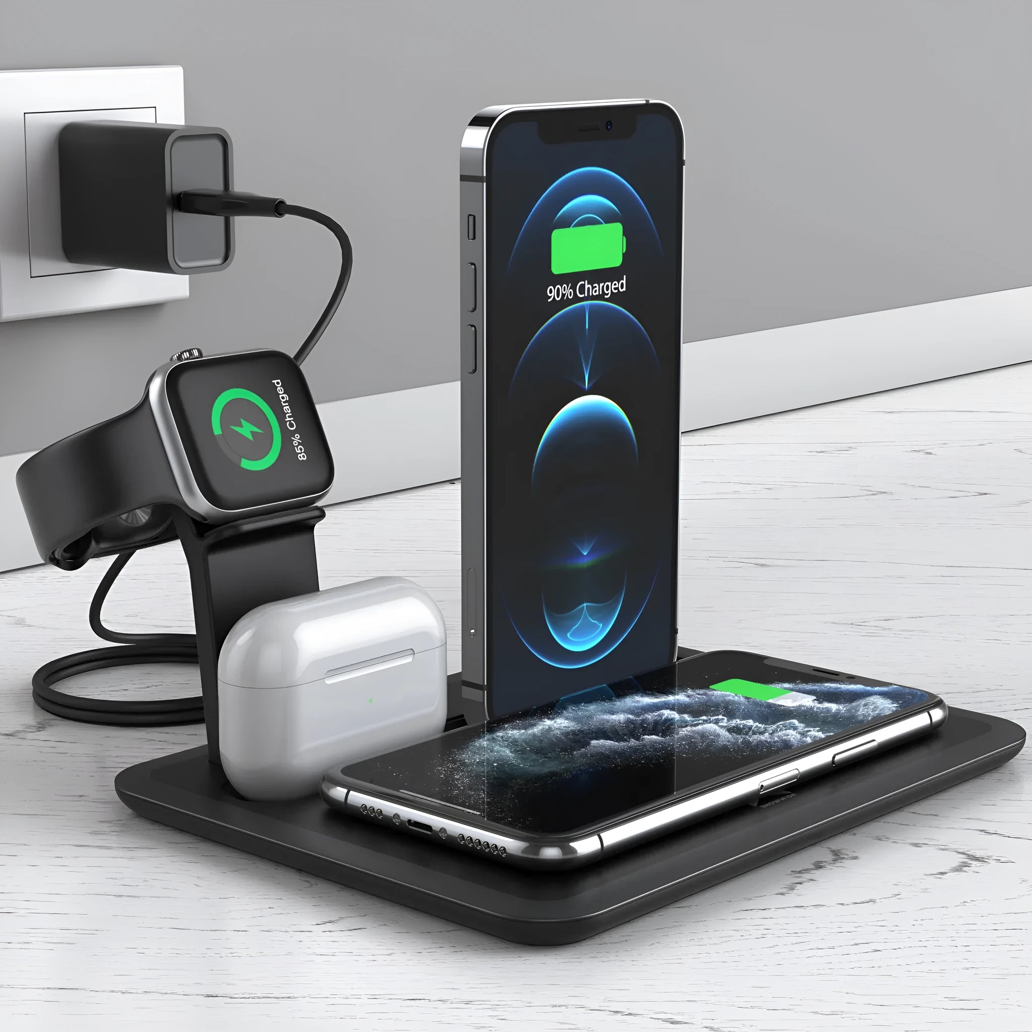 Black desktop wireless charging station with phone on pad, watch in bracket, and headphones on hook.