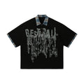 Men's loose fit short-sleeved top with graffiti printing on asymmetric lapel, in cotton fabric.