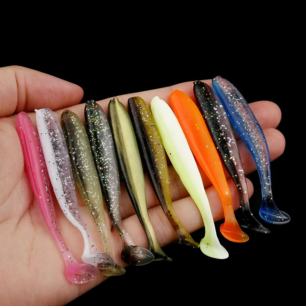 Two-tone soft plastic fishing lure with T-tail design measuring 7 centimetres