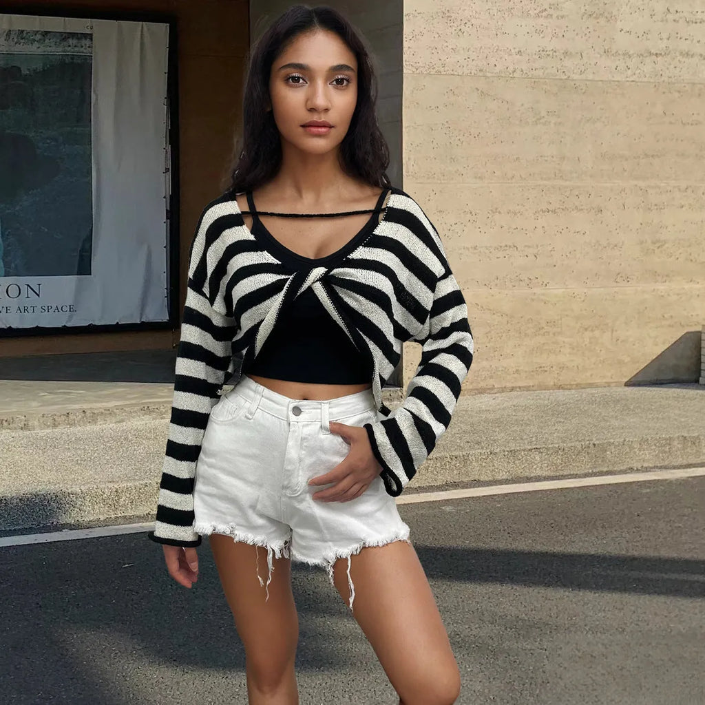 Striped long-sleeved pullover sweater in mercerised cotton, shown in multiple colours with front-and-back wearable design