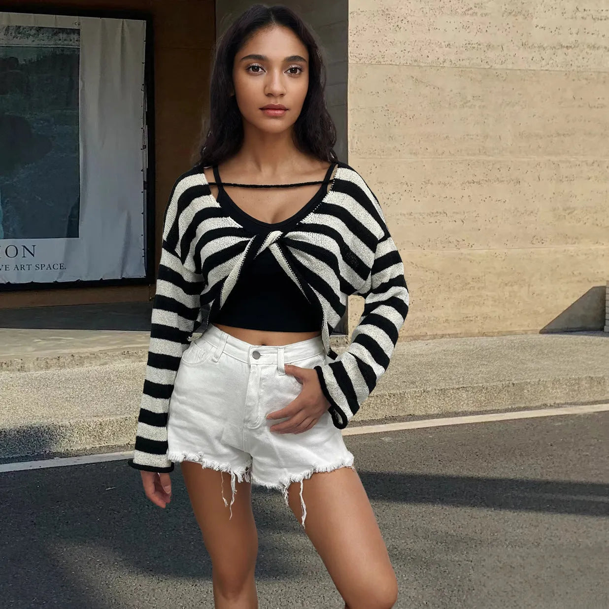 Striped long-sleeved pullover sweater in mercerised cotton, shown in multiple colours with front-and-back wearable design