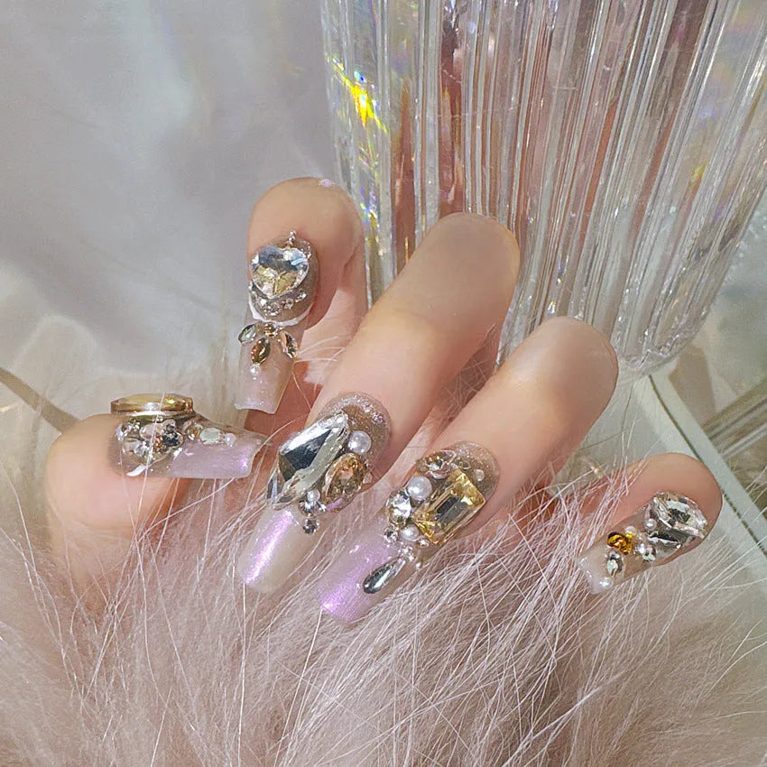 Rhinestone decorated false nail patches on card, with choice of jelly adhesive or tool set.