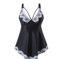Plus size green two-piece swimsuit bikini set with sleeveless top and briefs bottom.