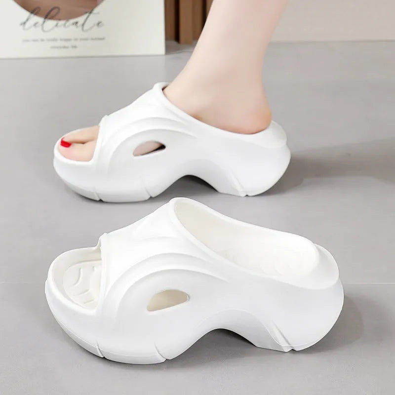 Women's EVA thick-soled slippers in white, black, and rose red colours with round toe design