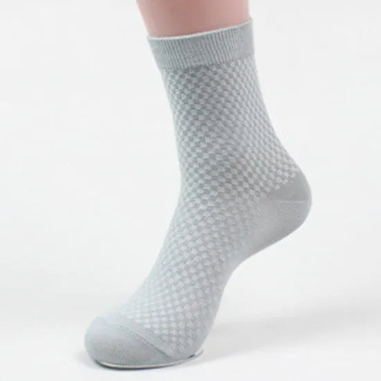 Men's bamboo fibre business socks showing small square pattern design in neutral colour options