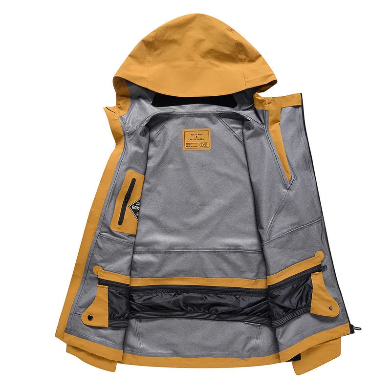 A unisex thin ski suit in yellow, shown on a model, designed for windproof and waterproof winter sports.