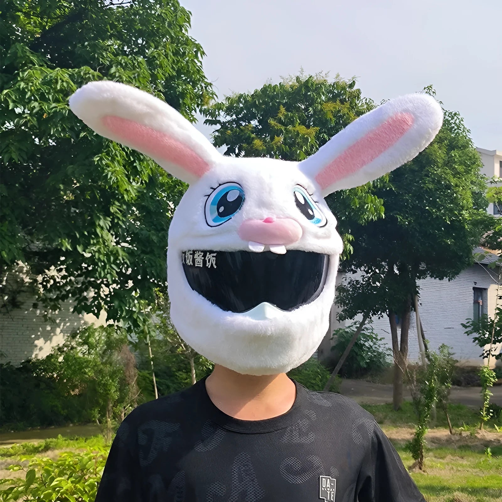 White plush rabbit head helmet cover for electric motorcycle with long ears and needle plush detailing