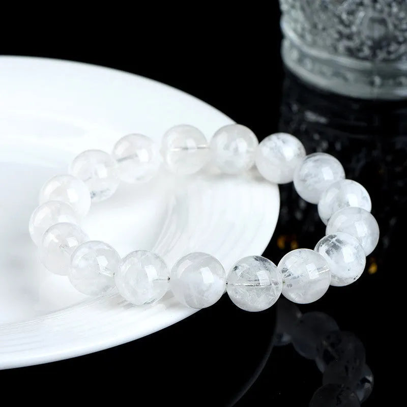 Women's crystal bracelet with blizzard snowflake round beads featuring ruyi and xiangyun design elements.