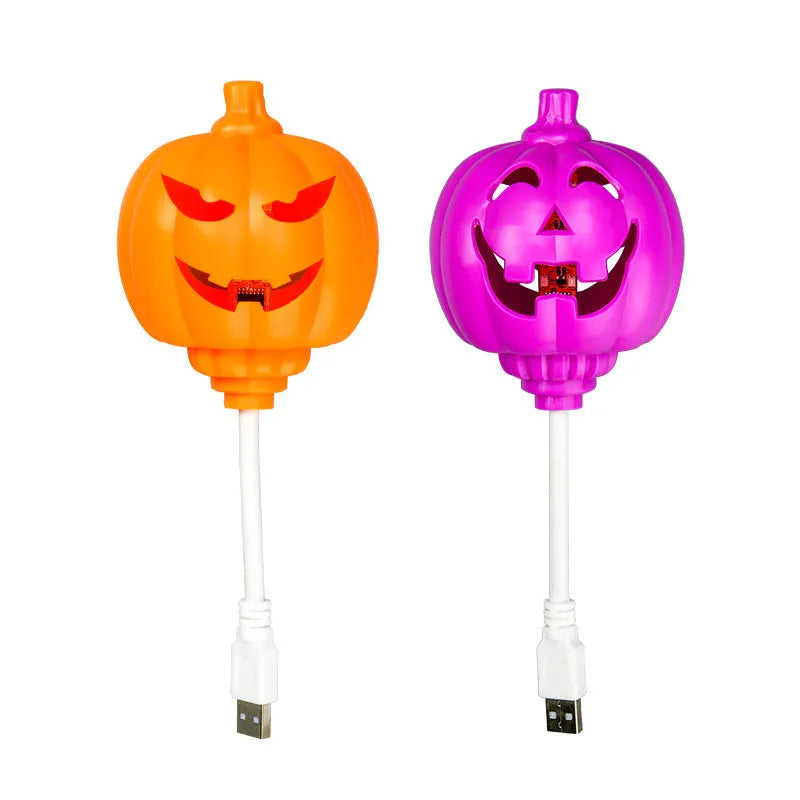 Pumpkin shaped USB rechargeable lamp with yellow or purple light options for holiday decoration