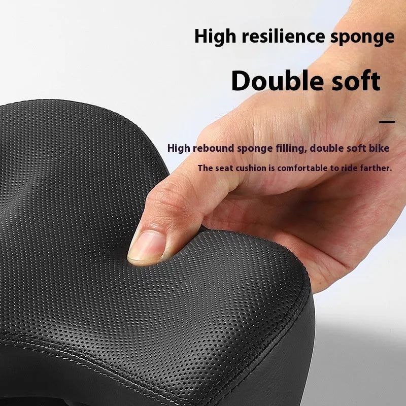 Black bicycle saddle cushion with leather exterior and thickened foam padding for shock absorption