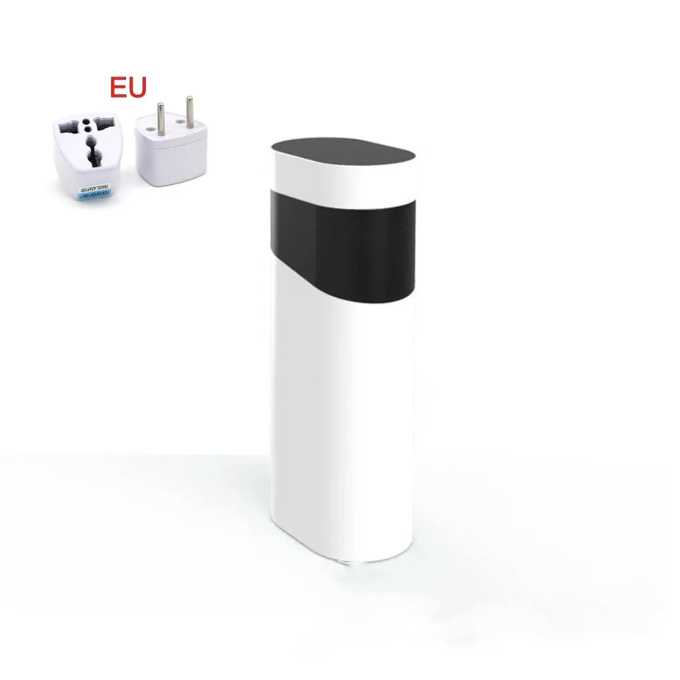 Small black or green desktop instant water dispenser with digital temperature display.