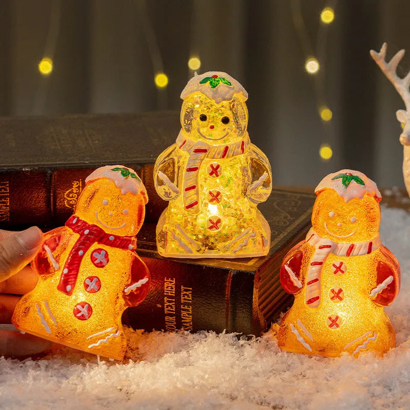 Set of four glowing plastic gingerbread man Christmas ornaments with red, white, and transparent scarves on a festive background.