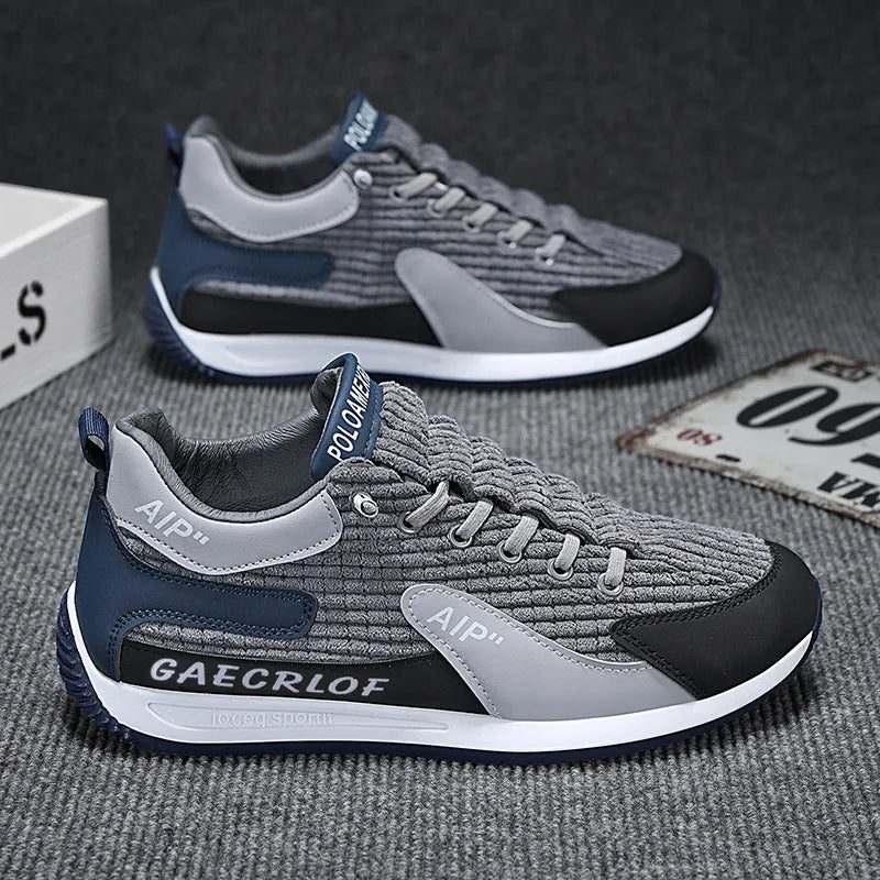 Men's green and grey mesh running shoes with round toe design and front lace-up closure