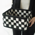 Checkerboard pattern folding felt storage basket measuring 37 by 29 by 19.5 centimetres